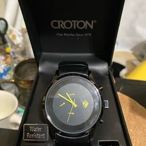 Croton Timepiece with Black Strap and Yellow Details